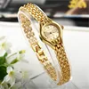 Montre-bracelet dorée pour femmes