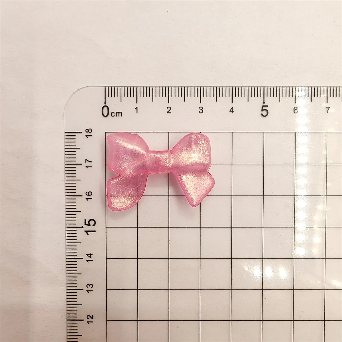10pcs 33mm * 24mm 아크릴 나이트 글로우 스파클링 파우더 보우 비즈 전화 체인 쥬얼리 액세서리 빛나는 Bowknot