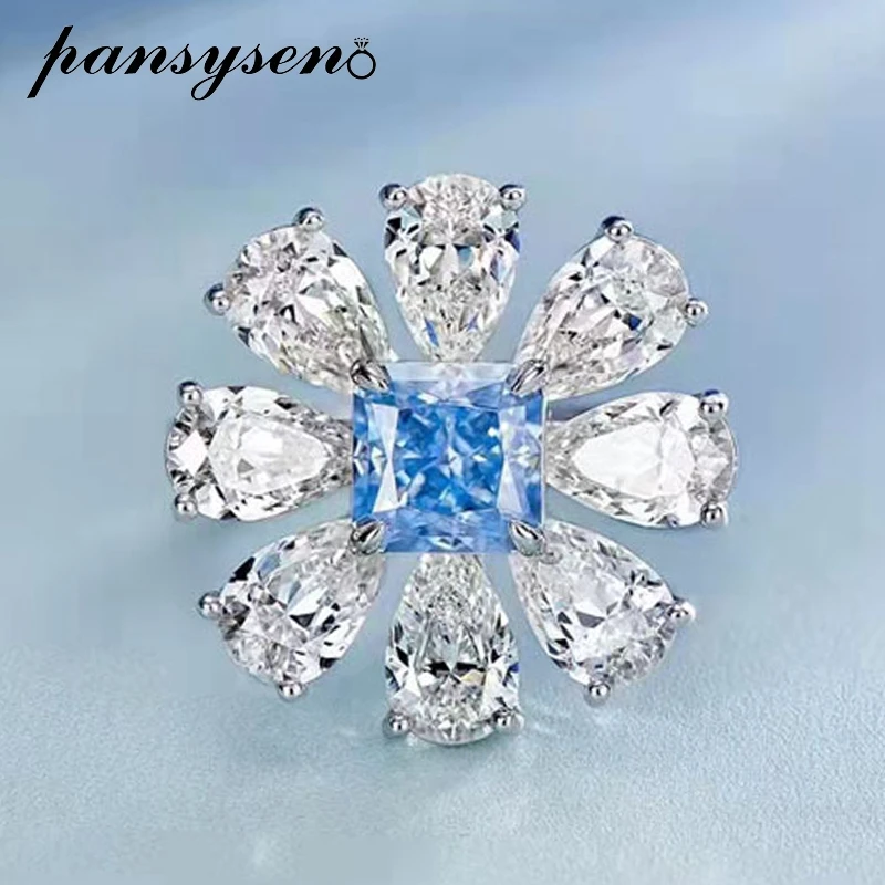 

PANSYSEN Luxury 925 Sterling Silver Radiant Cut Aquamarine High Carbon Diamond Gemstone Ring 18K White Gold Plated Wedding Gift