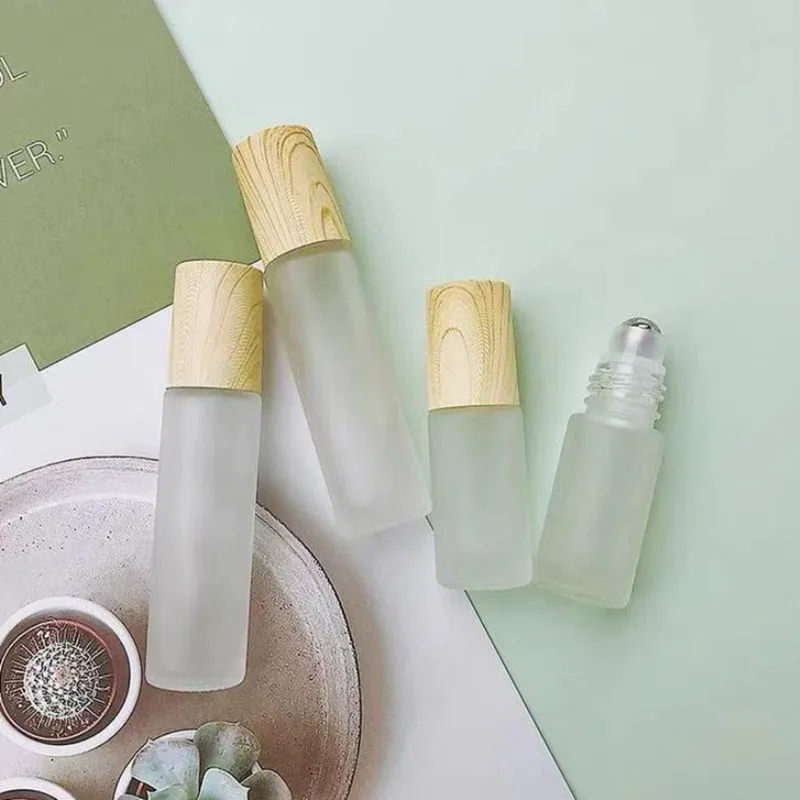 200pcs High Quality 5ml 10ml clear Roller Ball Matte Glass Roll on Bottle with Wood Bamboo Lid 3