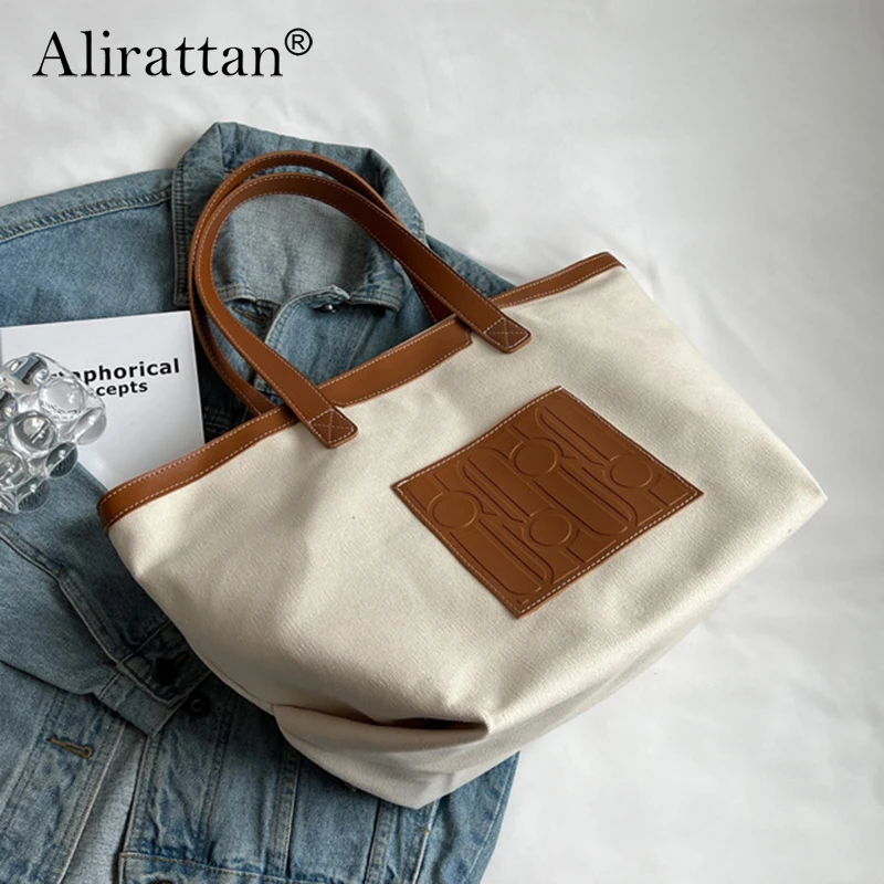 

Alirattan Large-Capacity Canvas Bag 2023 New Commuter To Work Portable Splicing Simple And Versatile One-Shoulder Women's Bag