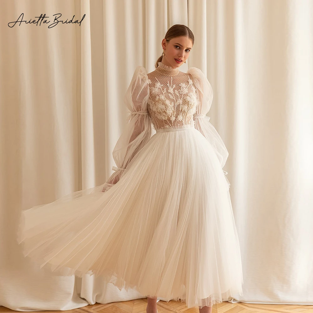 

Платье Свадебное ТРАПЕЦИЕВИДНОЕ с длинным рукавом, высоким воротом и аппликацией