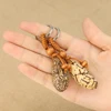 Personality Creative Natural Material Polished Thousand Eyes Bodhi Handlebar Key Chain Pendant DIY Car Pendant School Bag Buckle 3