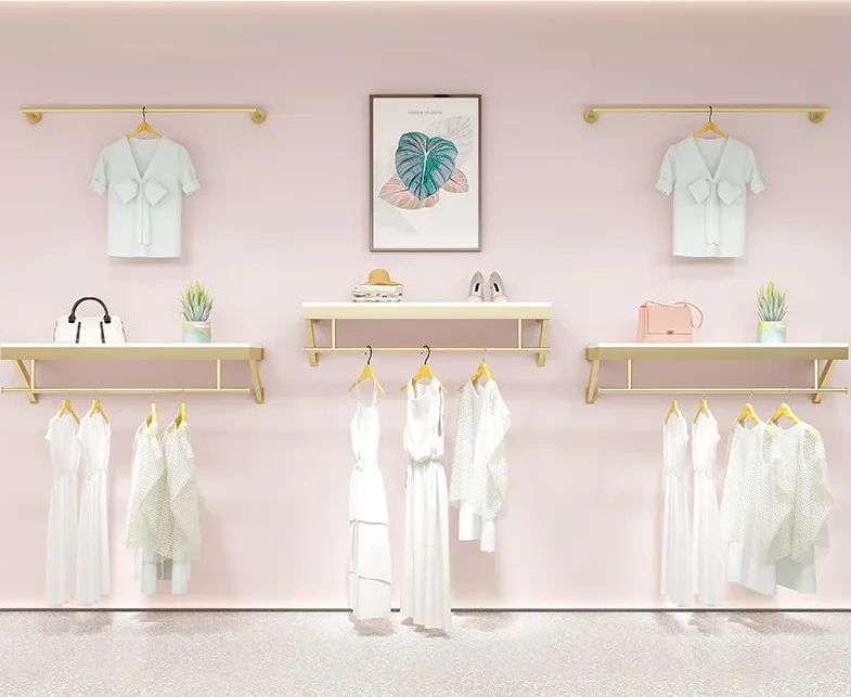

Wall mounted display shelf of clothing store Gold iron wall mounted iron clothes hanger