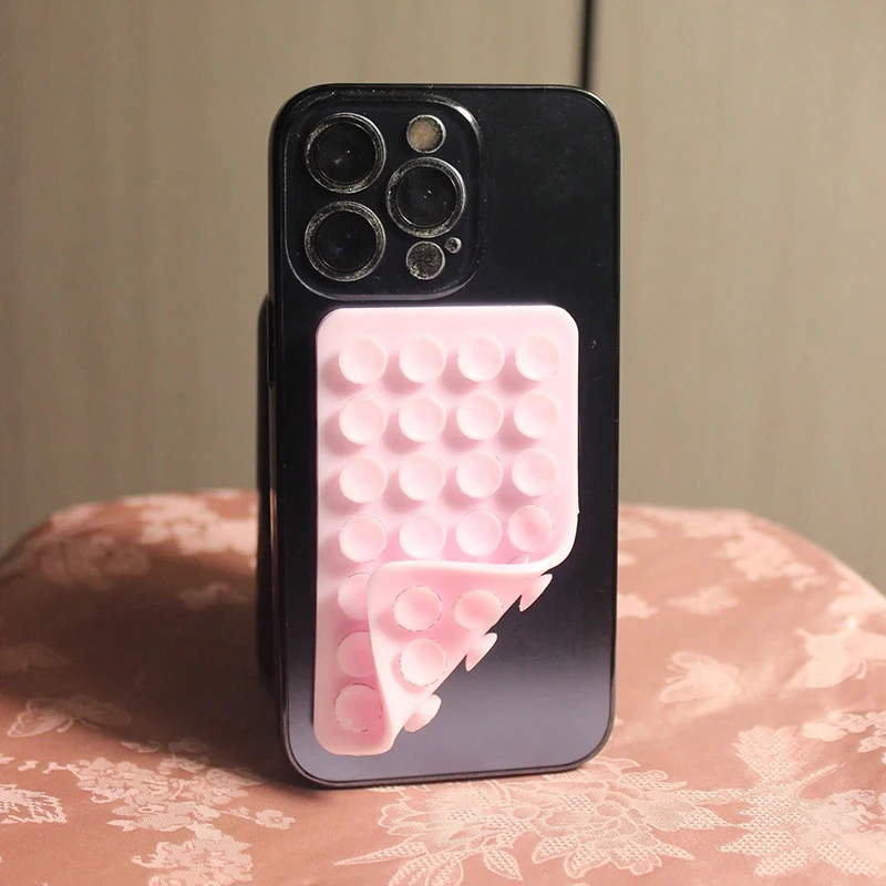 جراب هاتف مزود بكوب شفط من السيليكون - حامل قوي بدون استخدام اليدين على الوجهين لهاتف iPhone Android لمرآة السيارة والحمام والمطبخ