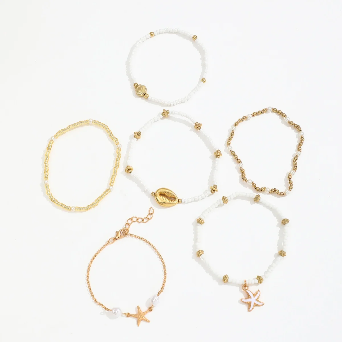 Conjunto de pulseiras vintage de missangas com estrela e concha_voghion.com