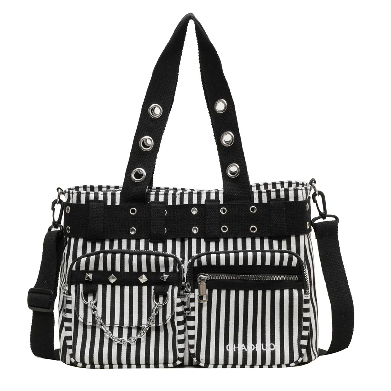 thumbnail image 1 of Bolso de lona para mujer 2024, nuevo bolso de mano a rayas para ir al trabajo, bolso cruzado retro versátil de un solo hombro con diseño de chica picante de metales pesados, 1 of 5