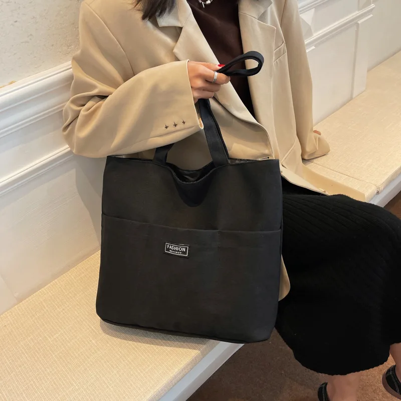 Solid color street trend canvas large bag new personality large capacity casual shoulder bag