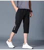 Summer 2022 Men's Casual Shorts Thin Loose Elastic Healthy Sports Cropped Pants Plus Fertilizer Plus Size 5XL Beach 3/4 Pants 4