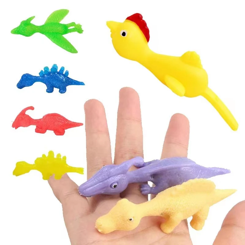 

Hot Creative Dinosaur Finger Toys Kids Funny Cartoon Animals Anxiety Stress Relief Shooting Playing Toy Slingshot Catapult Game