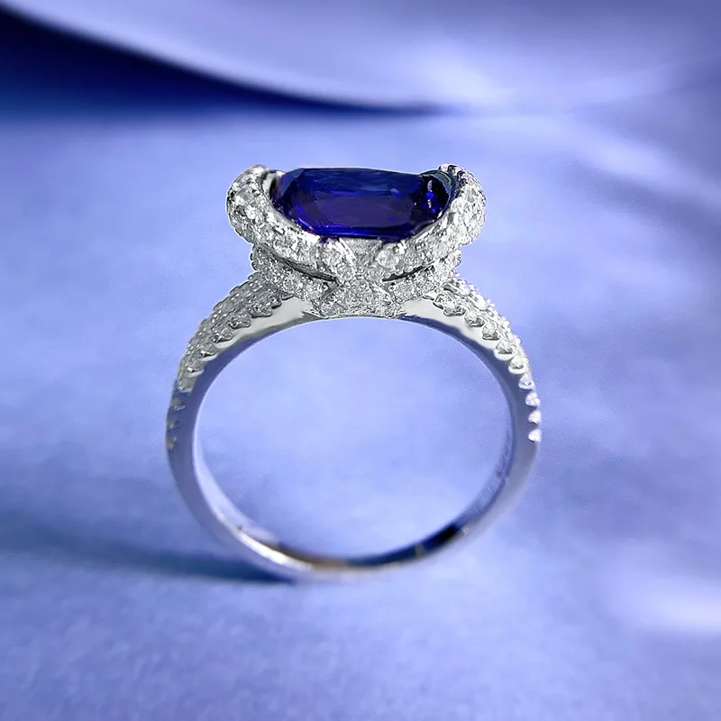 

Jewelry 2023 New 925 Silver Blue Treasure 7 * 9 Oval Ring Women's Luxury Micro Inlay Cross border One Piece Shipping