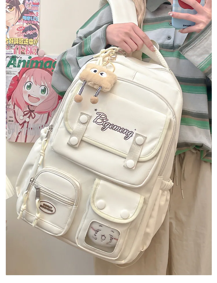 حقيبة ظهر جديدة لعام 2025 لطلاب المدارس الثانوية والمدرسة الابتدائية حقيبة ظهر مدرسية متعددة الاستخدامات مع دمية