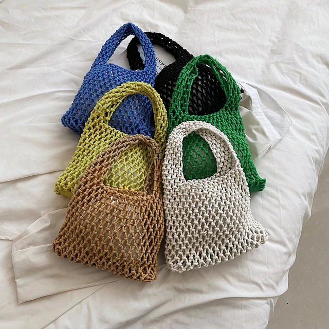 Nuova borsa da spiaggia all'uncinetto per ragazze Corda di paglia estiva Scava fuori Borsa da donna intrecciata a mano Borsa da donna a maglia vuota_voghion.com