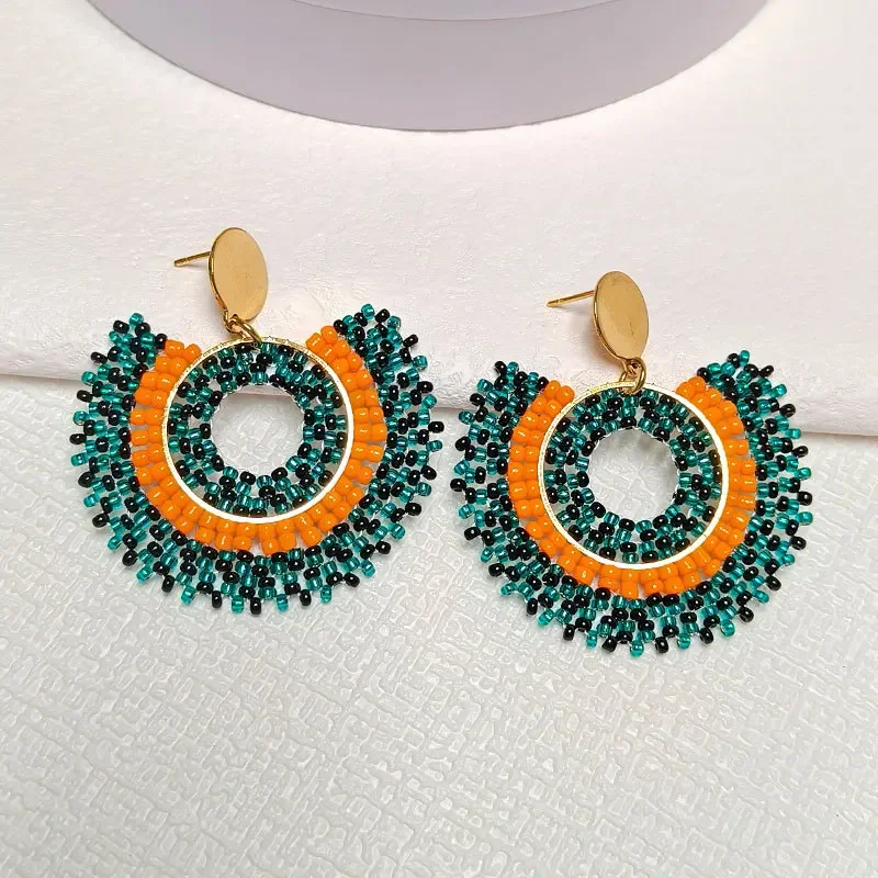 

Rice bead earrings Sunflower Originality Colour Hand knitting Bohemia Crystal Fashion Simple Alloy Beaded earrings