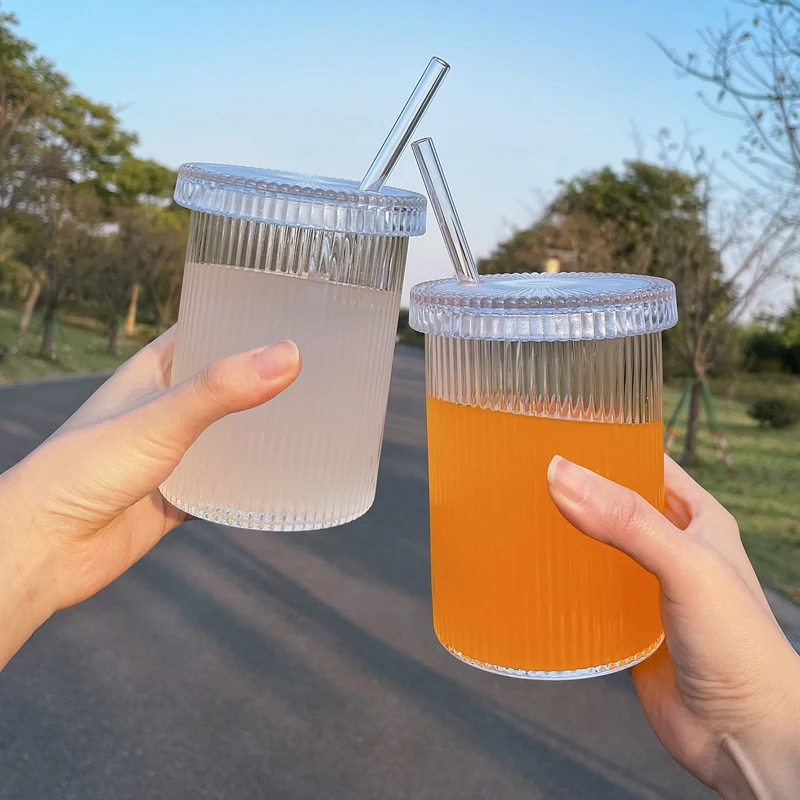 https://ae01.alicdn.com/kf/Sf39e75666e3f4104aa46e036de424e83P/Ins-Vertical-Stripes-Glass-Cups-with-Lids-and-Straws-Clear-Glass-Water-Bottle-Straw-Cup-Drinking.jpg