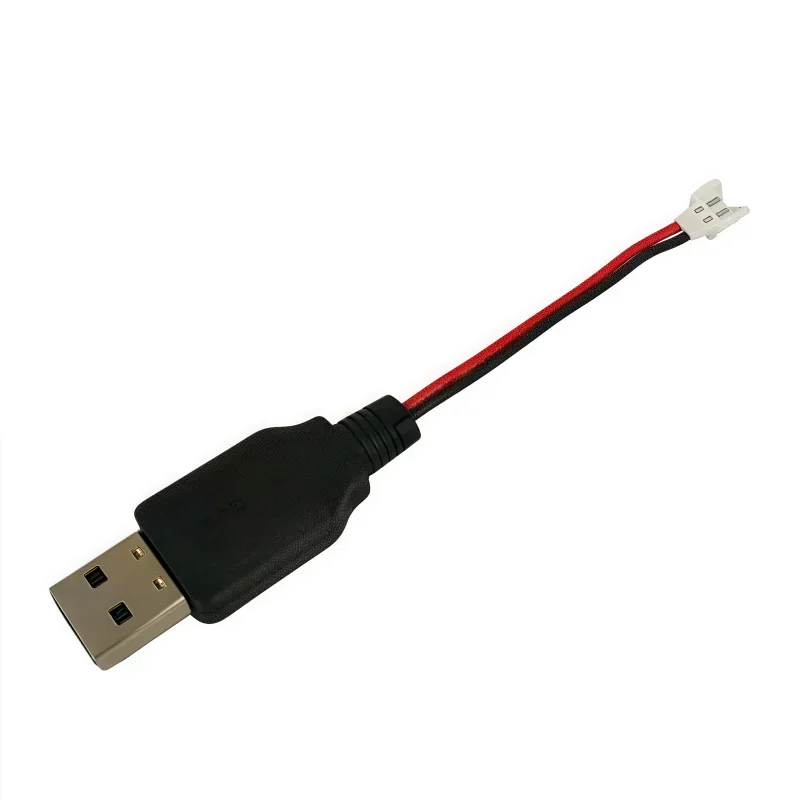 Câble chargeur USB 3.7V branché sur batterie drone RC, connecteurs JST et Futaba visibles