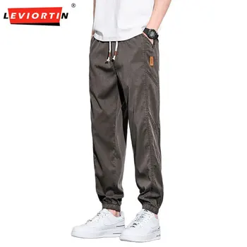 Pantaloni casual con coulisse allentati in vita elastica da uomo urbano alla moda di nuova primavera Pantaloni attillati sportivi versatili di marca Harlan alla moda 1
