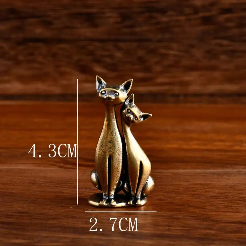 The Intertwined Loving Cats Brass Sculpture by KittyNook Cat Co. adds meaningful art decor to any space.