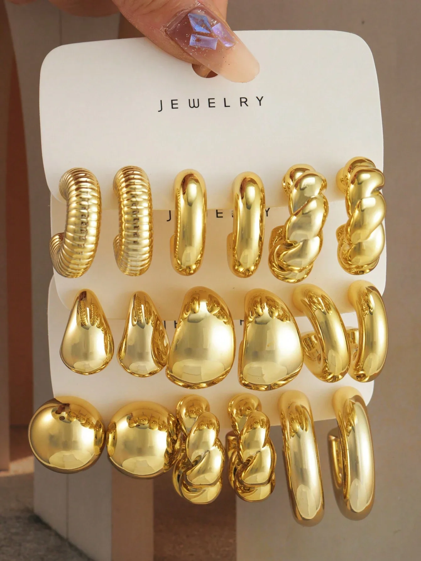 XL 2 Tear Shape Bottom 7 Rounds Earrings