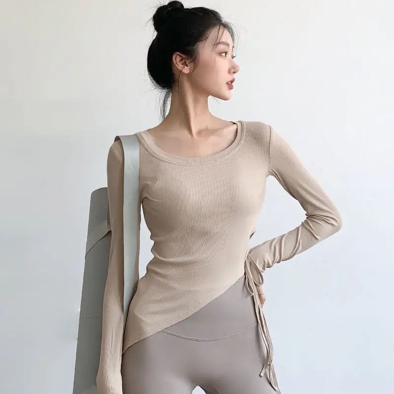 

Top women's tight fitting drawstring fitness suit sexy running long sleeved training fitness quick drying t-shirt