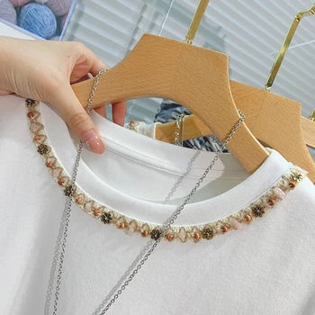 2025 النساء تي شيرت قصيرة الأكمام تيز عادية جديدة بلوزات بيضاء المرأة المحملة التطريز موضة السيدات تي شيرتات قطن المرأة تيز القمم 5