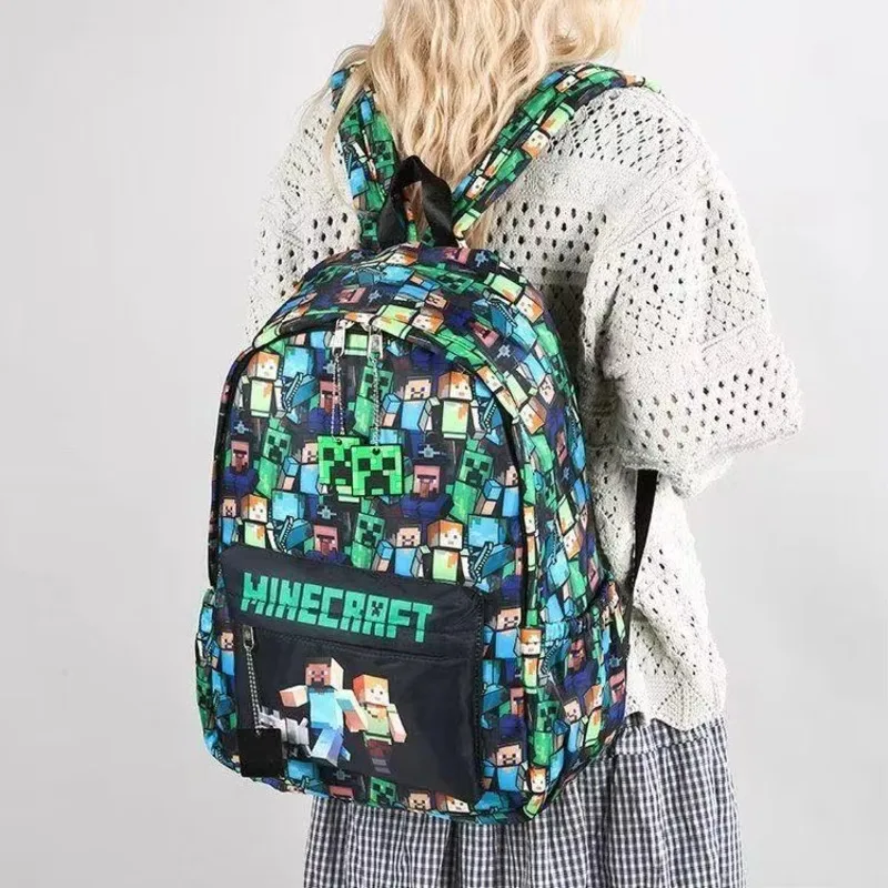 Sac à dos imprimé graffiti style jeu de pixels, léger, résistant à l'eau, pour l'école, les voyages quotidiens, les adolescents, les activités de plein air et l'université