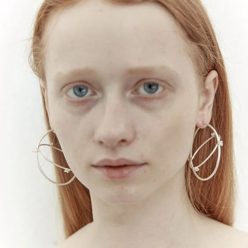 The New Double-Loop Rotating Earrings For 2024 Are A Party Gift For Women's Cyberpunk Style Copper Alloy Jewelry