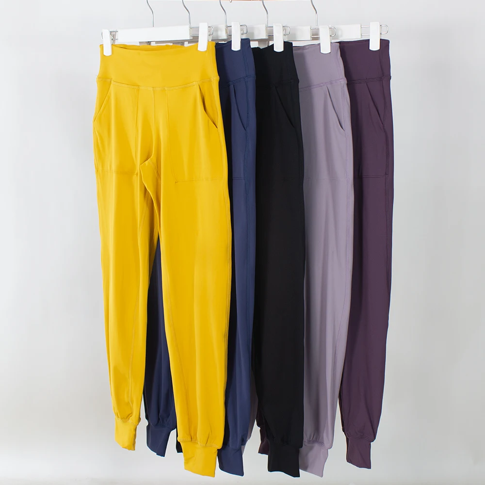 Sports Leggings Yoga Pants Female Tights Quick drying yoga clothes camping, playing ball, elastic high waist, foot binding pocket, jogging pants, women's sports fitness