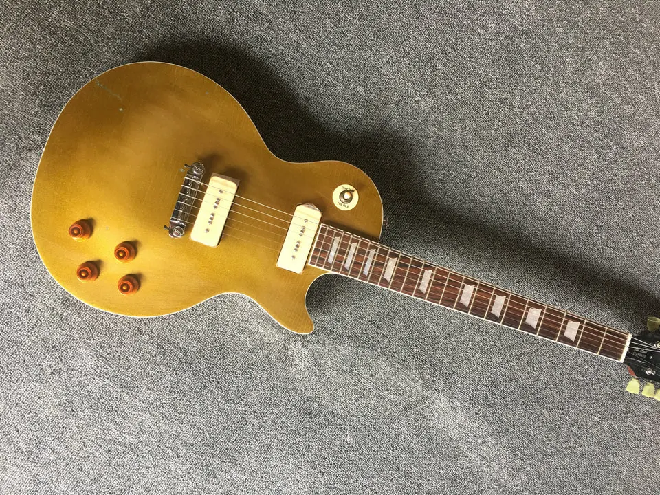 

Customized Electirc Guitar Relic Gold Top Nitro Lacquer With Many Crack Thin Lines One Piece Mahogany Body Andn Neck LP Guitar