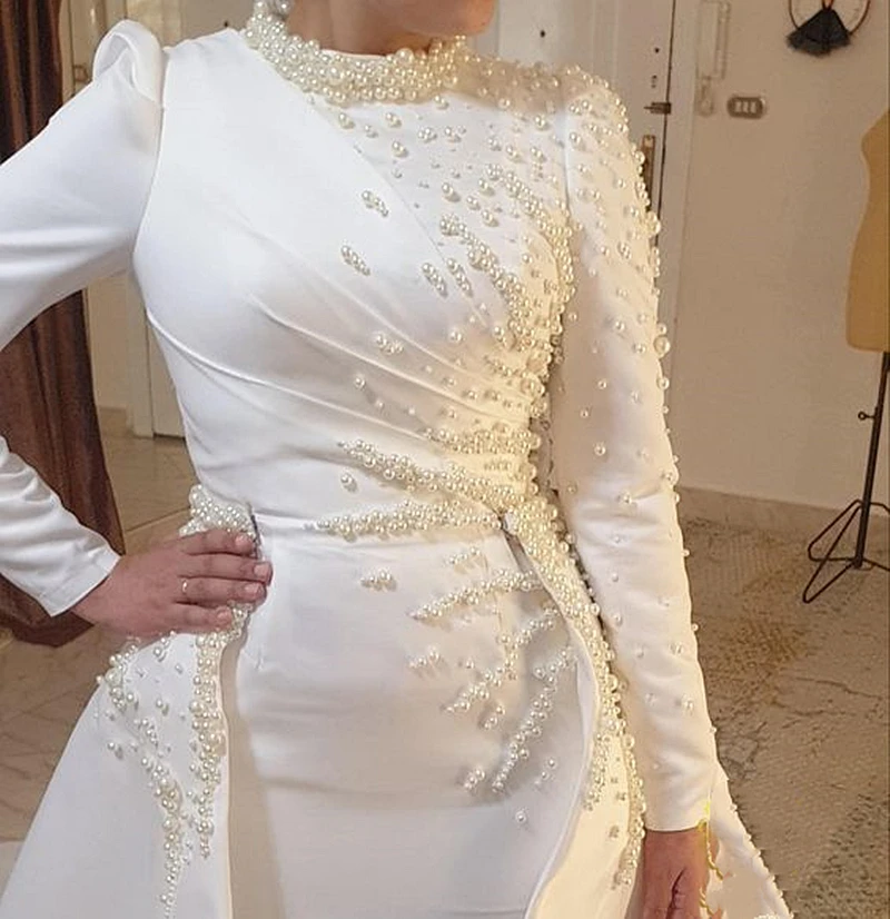 

Pearls Beaded white Mermaid Wedding Dress With Detachable Skirt Jewel Neck Long Sleeves Modest Arabic Bridal Gowns