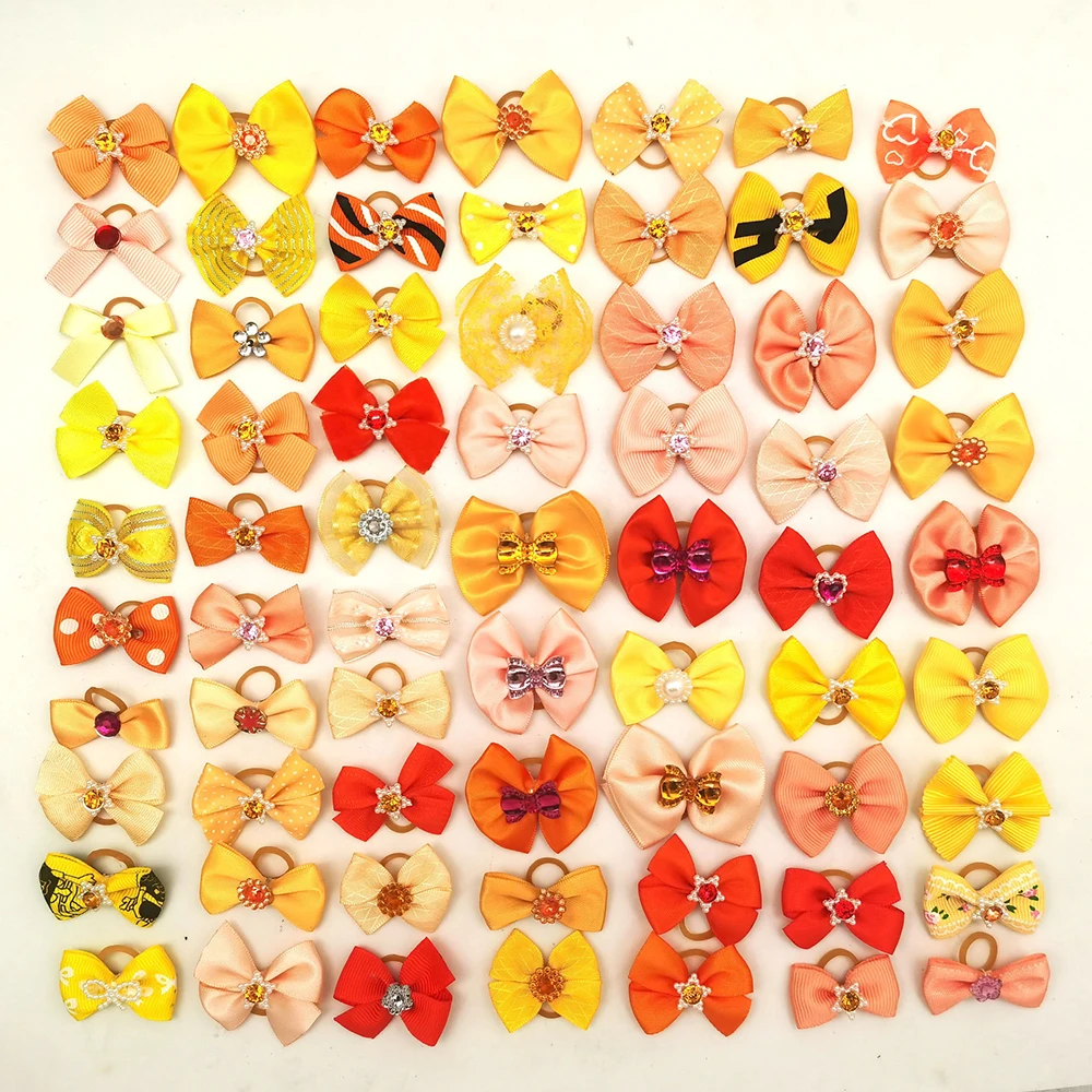 100pcs 애완 동물 손질 머리 활 강아지 믹스 색상 작은 개 머리 고무 밴드 개 공급 업체에 대 한 헤어 액세서리 장식