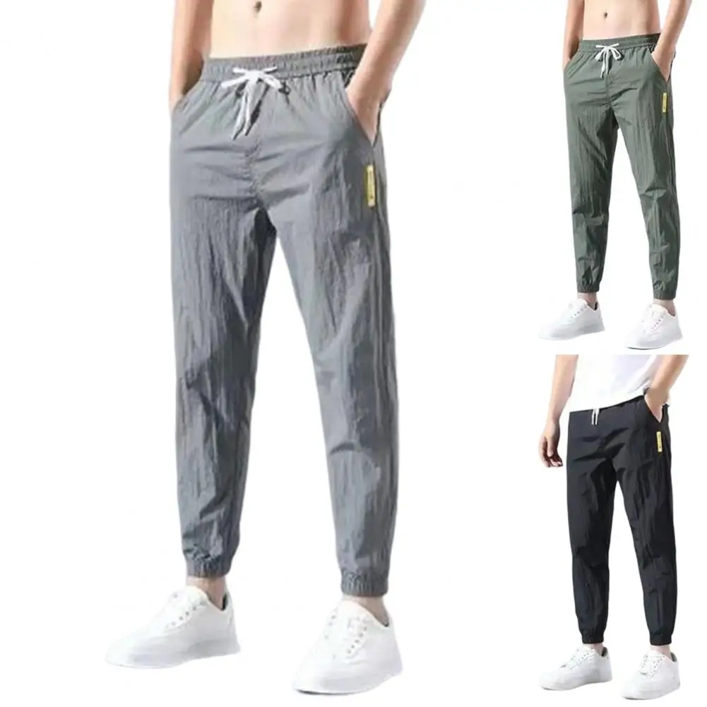 Description Picture 3 of itemMen Trousers Non-pilling Mid-waisted Polyester Summer Lace-up Pockets Men Sweatpants Drawstring Pants Daily Wear
