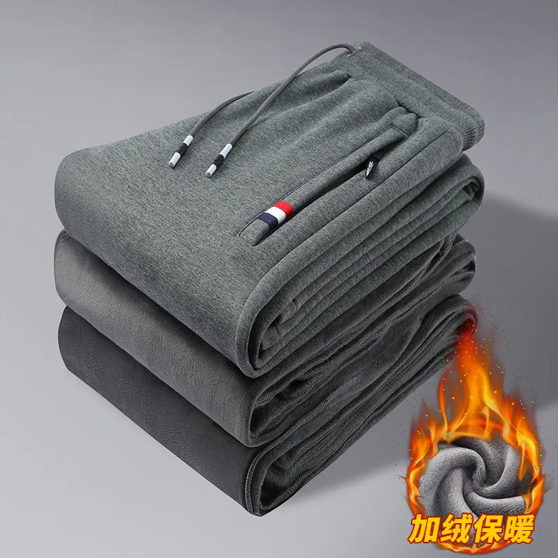 

Men's Elastic Waist Drawstring Solid Color Autumn and Winter New Fashion Loose Patchwork Pocket Zipper Casual Sports Wei Pants