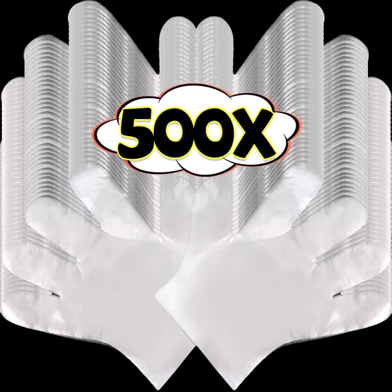 Gants vinyle jetables transparents en lot de 100 à 500 pièces, empilés sur fond blanc.