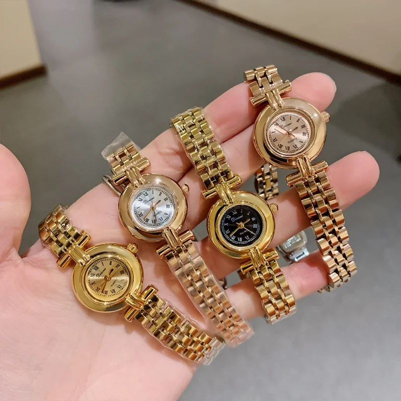 WOMEN'S watches fashion new fashion steel band wristwatch round disk vintage Roman simple quartz watch