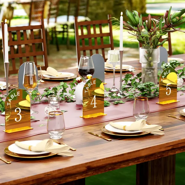 wooden tables and gold table numbers
