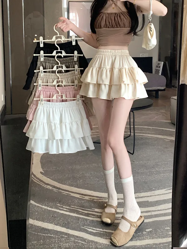 

Летняя короткая юбка для девочек, милая и универсальная Однотонная юбка с оборками по краям и эластичным поясом, Корейская версия, новинка 2024