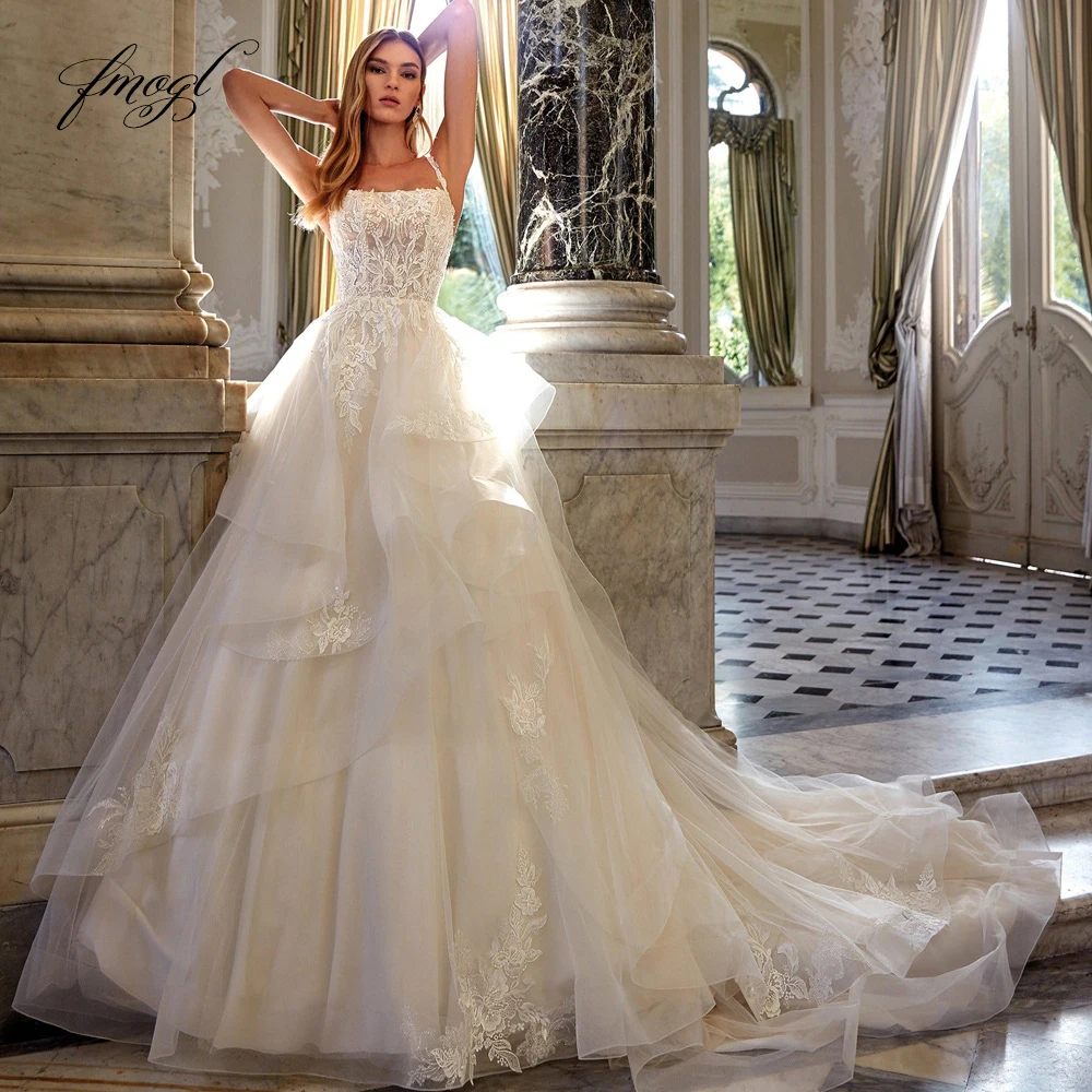 

Fmogl Sexy Backless Strapless Lace Vintage Wedding Dresses Luxury Appliques Beaded Spaghetti Straps Ruffles A Line Bridal Gown