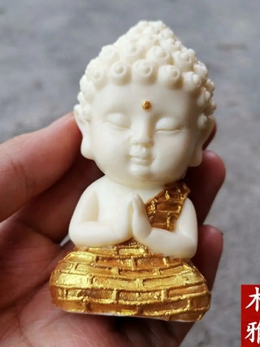 

Exquisite antique ivory fruit Q version lotus base Sakyamuni Buddha statue ornament