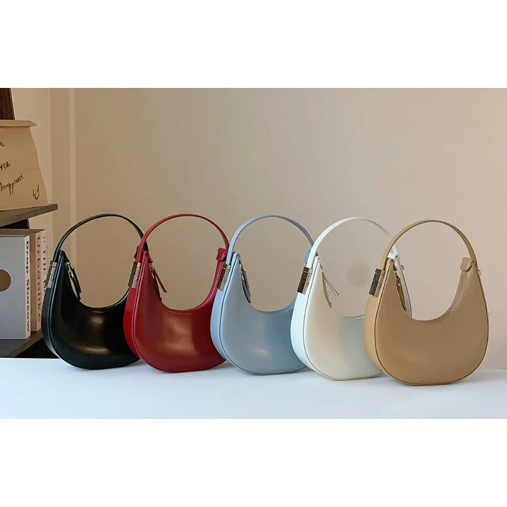 Schouder veelzijdige leren dames 2024 nieuwe high-end minimalistische oksel niche design halve maan tas_voghion.com