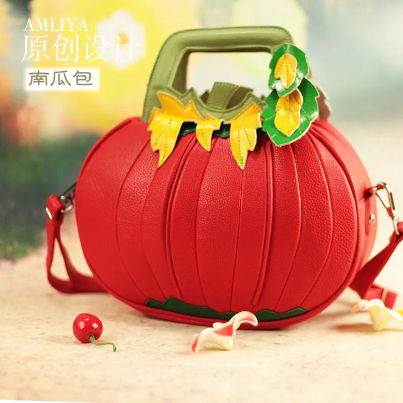 New leather women's bag in spring and summer Handheld one shoulder messenger bag Small round Pumpkin creative