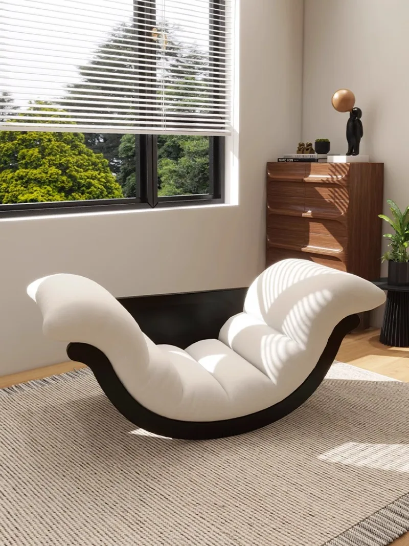 

Versatile rocker lounge chair Adult Thompson can serve as a couch lounger on the balcony and a moon rocker sofa