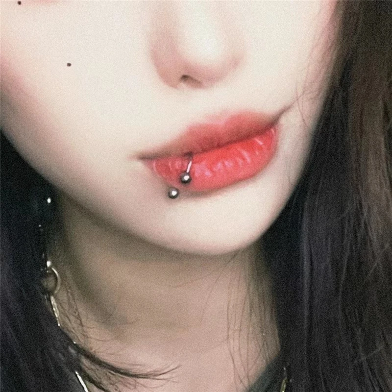 Guy Lip Piercing Snake Bites