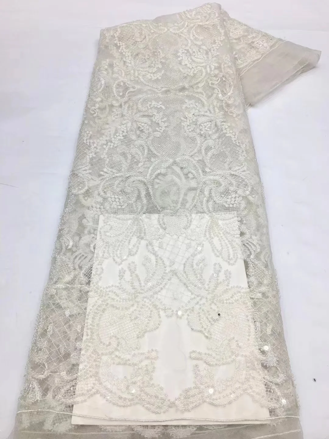 

African Groom White Lace Fabric 2023 High Quality Sequins Lace Embroidery French Net Lace Fabric With Pearl For Nigerian Party