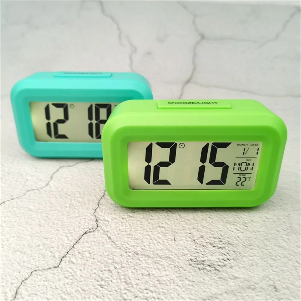 MiniLCDElectronicDigitalMovingAlarmClockWithBacklightTimeDate