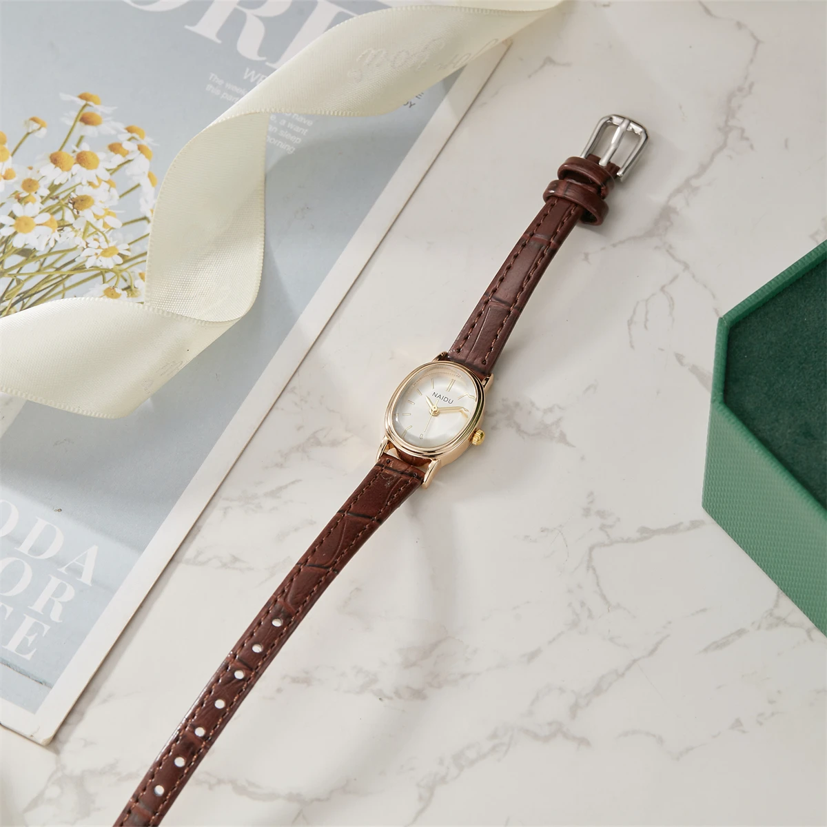 Elegant Ladies Quartz Watch with Smooth Oval Dial Design