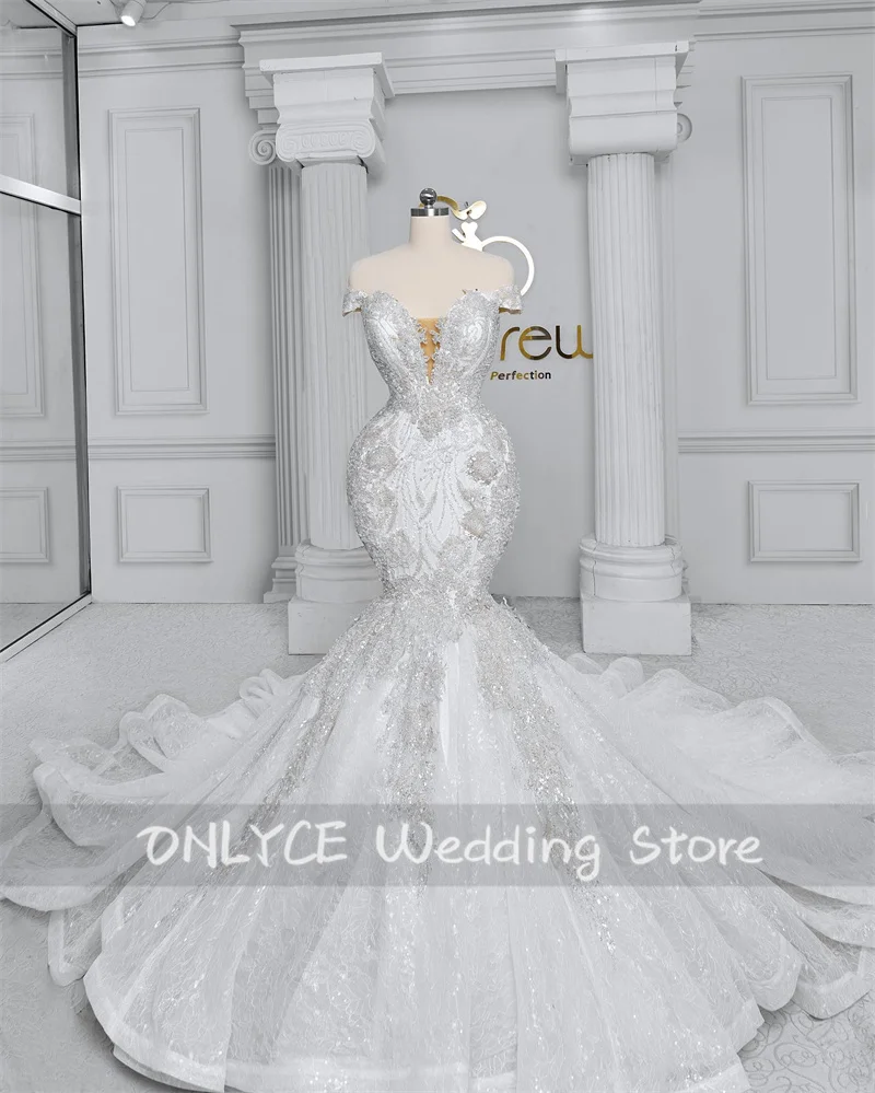 

Luxurious Off Shoulder Arabic Wedding Dresses Sparkly Beads Sequins Appliques Exquisite Bridal Ball Gowns Robe De Mariee Court