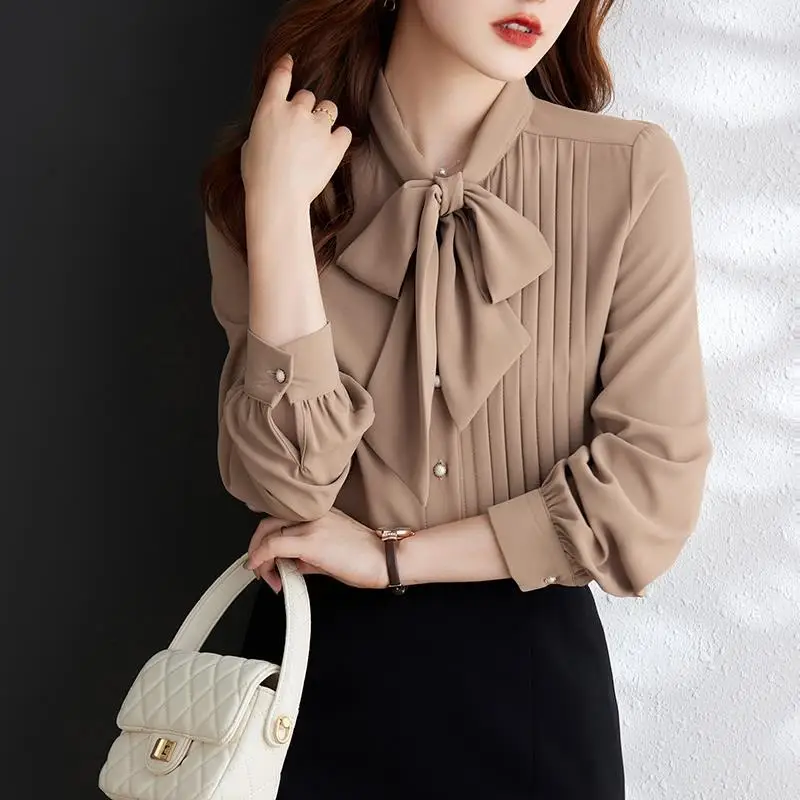 

Women's 2024 Summer New Spliced Bow Neck Button Screw Thread Fashion Solid Slim Irregular Casual Long Sleeved Blouses Shirts