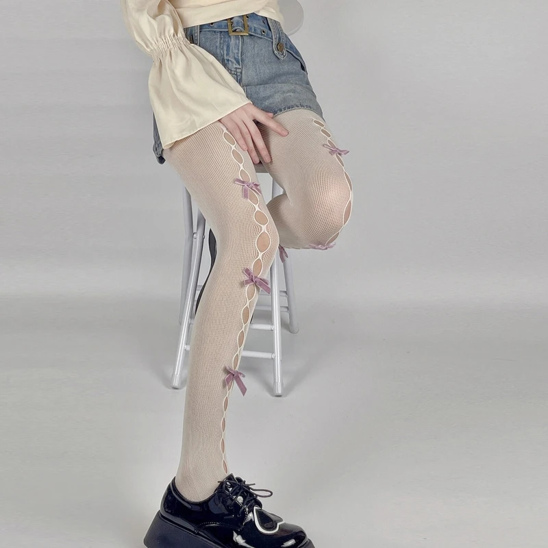 Collant da donna bianco a rete collant color crema con fiocco in