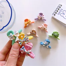 

Korean Version of The Colorful Floral Fabric Sweet Bow Side Clip Single Small Grab Clip for Children's Fashion Hair Accessories